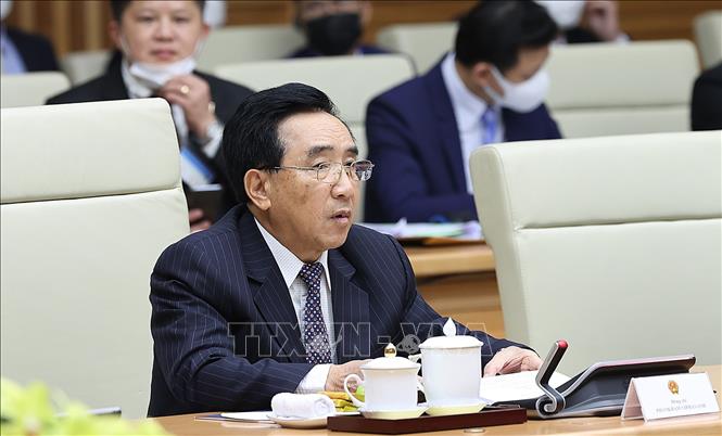 Trong ảnh: Thủ tướng Lào Phankham Viphavanh phát biểu tại cuộc họp. Ảnh: Dương Giang-TTXVN 