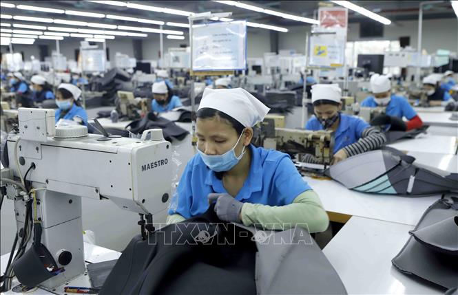 Photo: A production line of the Cellmech International Vina Co. Ltd at Khai Quang IZ. VNA Photo: Hoàng Hùng 