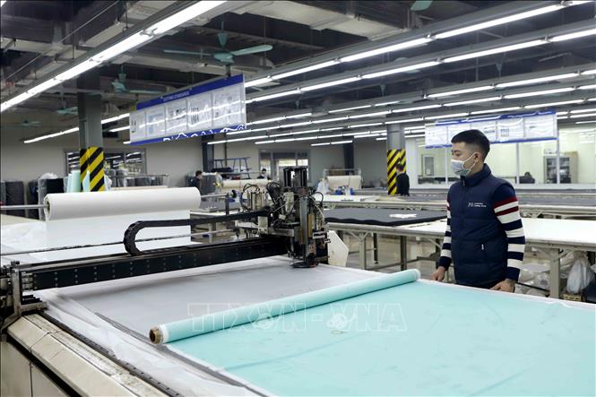 Photo: A production line of the Cellmech International Vina Co. Ltd at Khai Quang IZ. VNA Photo: Hoàng Hùng 