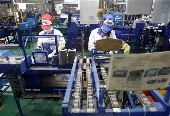 Photo: A production line of the Exedy Vietnam Co. Ltd at Khai Quang IZ. VNA Photo: Hoàng Hùng 