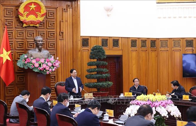 Photo: PM Pham Minh Chinh speaks at the meeting. VNA Photo: Dương Giang