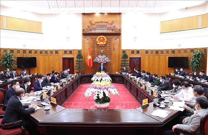 Photo: PM Pham Minh Chinh speaks at the meeting. VNA Photo: Dương Giang