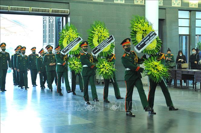 Trong ảnh: Các đoàn của Bộ Quốc phòng viếng Liệt sĩ, Trung tá Đỗ Anh. Ảnh: Minh Đức – TTXVN

