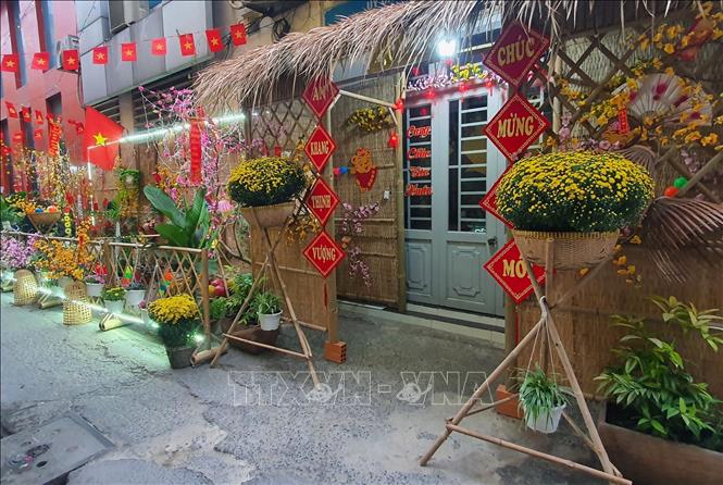 Trong ảnh: Nhiều không gian chụp ảnh cho người dân tại hẻm 89 Hàm Nghi (Quận 1). Ảnh: Thu Hương - TTXVN