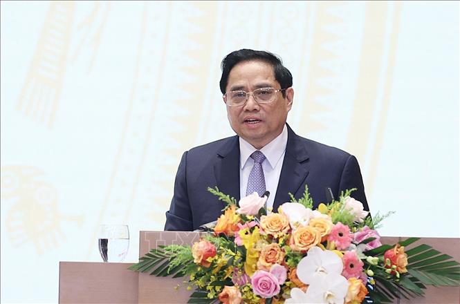 Trong ảnh: Thủ tướng Phạm Minh Chính phát biểu tại buổi gặp mặt kiều bào dự Xuân quê hương năm 2022. Ảnh: Dương Giang-TTXVN
