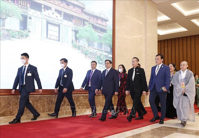 Trong ảnh: Thủ tướng Phạm Minh Chính với các kiều bào dự Xuân quê hương năm 2022. Ảnh: Dương Giang-TTXVN