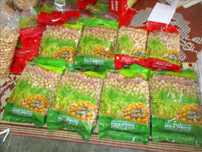 Trong ảnh: Kẹo nhãn Lang Chánh được bán với giá 100.000 đồng/túi. Ảnh: Nguyễn Nam-TTXVN