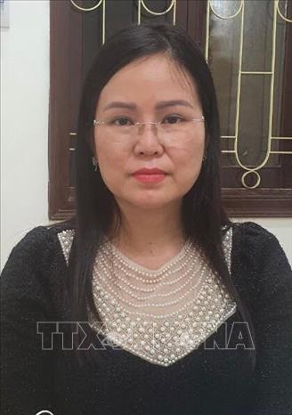 Trong ảnh: Bị can Nguyễn Thị Hương Lan, sinh năm 1974, tại Hà Nội; nghề nghiệp: Cục trưởng Cục Lãnh sự, Bộ Ngoại giao. Ảnh: TTXVN phát