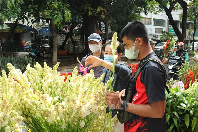 Trong ảnh: Khu vực bán hoa tươi hút khách mua sắm tết tại khu chợ Glodok của người Hoa ở thủ đô Jakarta của Indonesia. Ảnh: Hữu Chiến - P/v TTXVN tại Jakarta