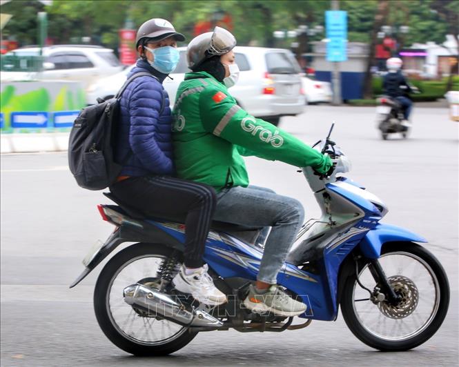 Dịch vụ xe ôm công nghệ được hoạt động trở lại sau hơn 6 tháng. Ảnh: Tuấn Đức - TTXVN