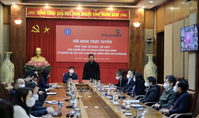 A video conference on presentation of social, health insurance books to needy people is held on February 22.