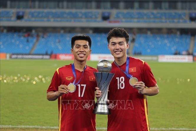 Photo: Vietnam U23 football players cheer for their victory. VNA Photo: Nguyễn Vũ Hùng