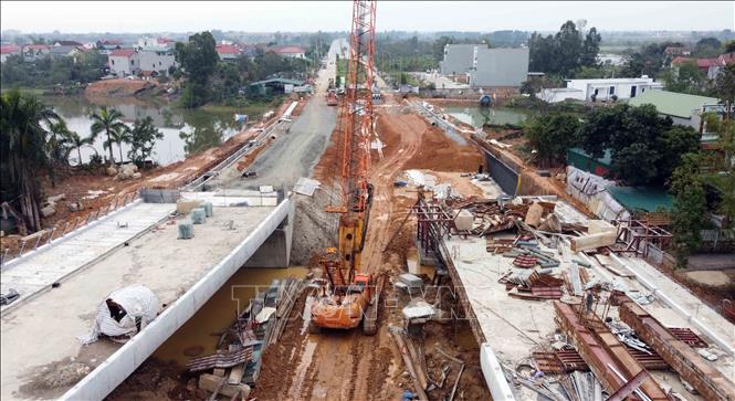 Trong ảnh: Cầu Đầm Vạc đang trong giai đoạn nước rút để dự kiến đưa vào sử dụng vào tháng 5/2022. Ảnh: Hoàng Hùng – TTXVN