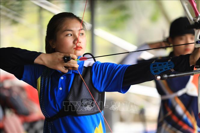 Trong ảnh: Các cung thủ đang tích cực tập luyện nâng cao thành tích. Ảnh: Hoàng Hiếu - TTXVN 