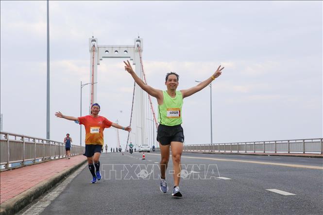 Photo: Runners at the marathon. VNA Photo: Trần Lê Lâm