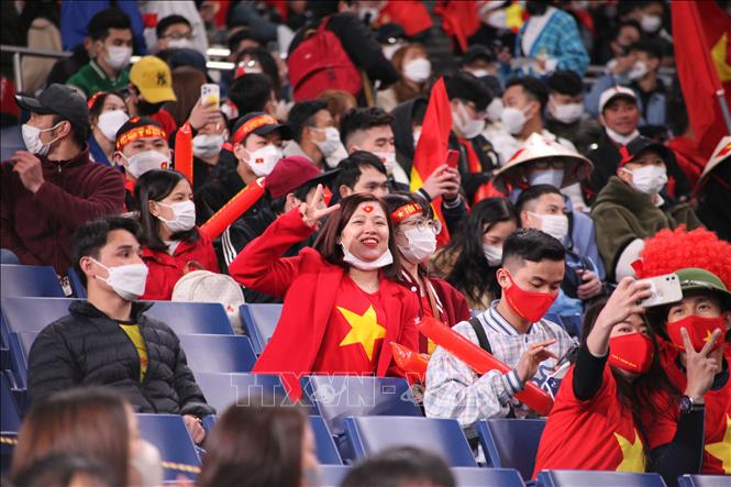 Photo: Vietnamese fans cheer for national team at Saitama Stadium. VNA Photo: Đào Thanh Tùng