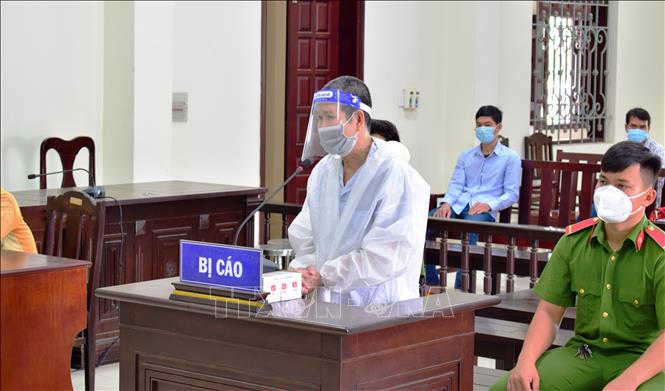 Bị cáo Nguyễn Thành Nghĩa tại phiên xét xử. Ảnh: Thanh Tân - TTXVN