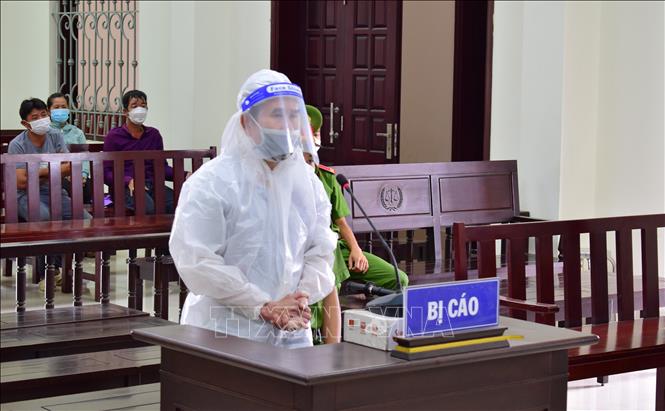 Bị cáo Nguyễn Thành Nghĩa tại phiên xét xử. Ảnh: Thanh Tân - TTXVN