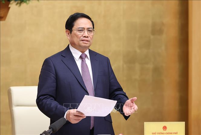 Prime Minister Pham Minh Chinh chairs the Government’s regular meeting. VNA Photo: Dương Giang