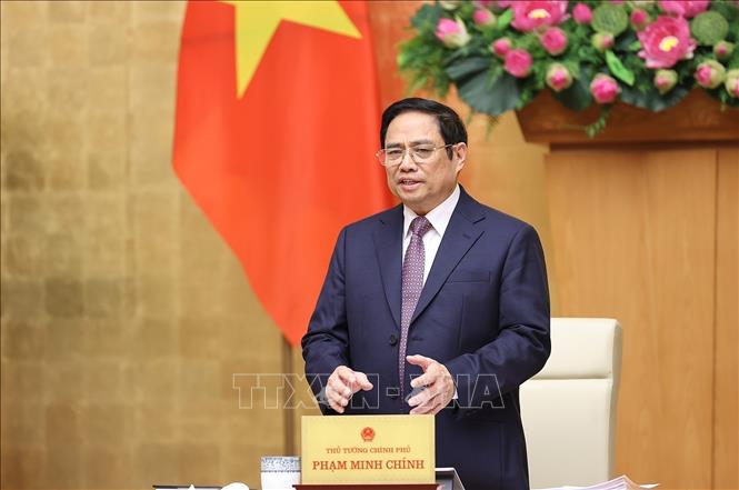 Prime Minister Pham Minh Chinh chairs the Government’s regular meeting. VNA Photo: Dương Giang