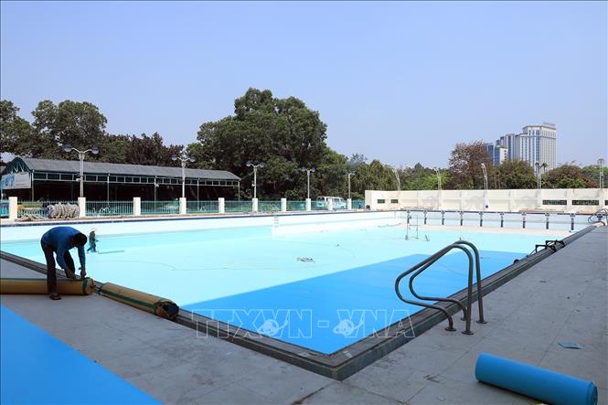 Trong ảnh: Khu bể bơi ngoài trời là nơi cho các vận động viên khởi động trước khi vào thi đấu. Ảnh: Tuấn Anh - TTXVN 