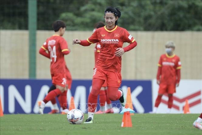 Photo: Vietnamese female players during a training session at the Vietnam Youth Football Training Center in Hanoi. VNA Photo: Minh Quyết 