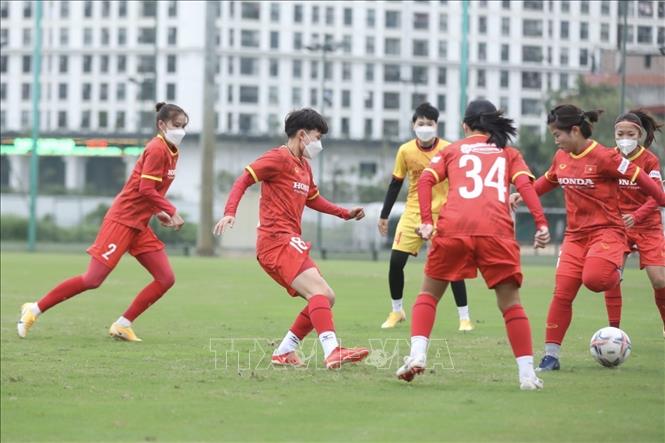 Photo: Vietnamese female players during a training session at the Vietnam Youth Football Training Center in Hanoi. VNA Photo: Minh Quyết 