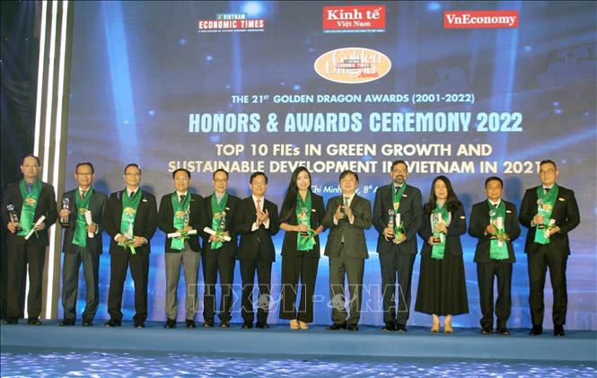 Photo: Top 10 outstanding FIEs are honoured. VNA Photo: Mỹ Phương 