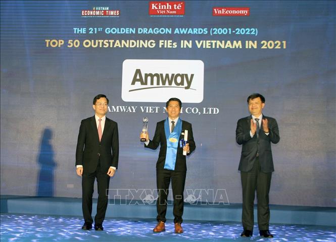 Photo: Businesses in education and healthcare are honoured. VNA Photo: Mỹ Phương 