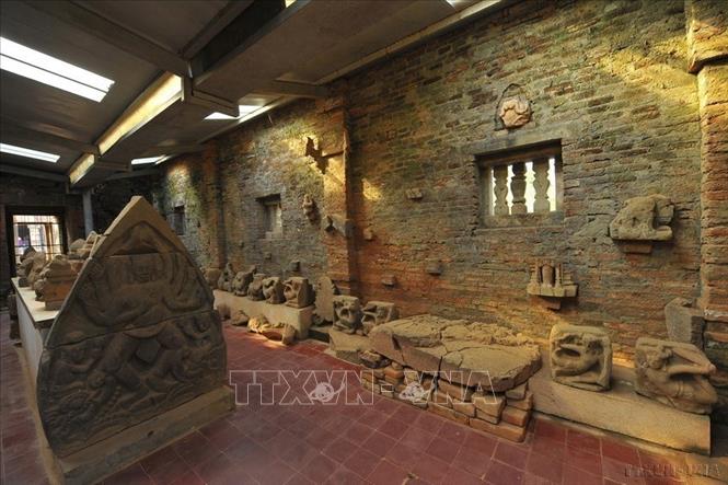 Photo: Artifacts are displayed at the relic site. VNA Photo