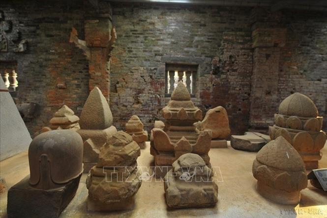 Photo: Artifacts are displayed at the relic site. VNA Photo