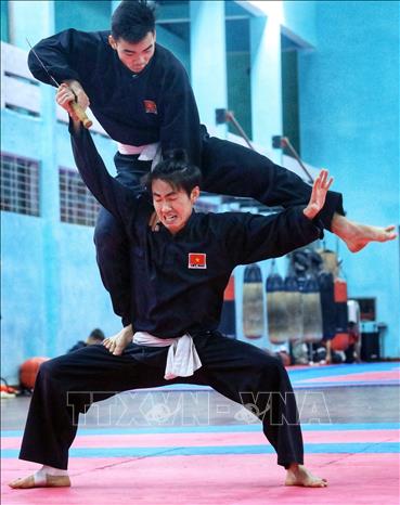 Trong ảnh: Hai vận động viên đội tuyển Việt Nam tập luyện Silat Seni (biểu diễn) nội dung Tunggal. Ảnh: Tuấn Anh - TTXVN