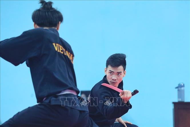 Trong ảnh: Hai vận động viên đội tuyển Việt Nam tập luyện Silat Seni (biểu diễn) nội dung Tunggal. Ảnh: Tuấn Anh - TTXVN