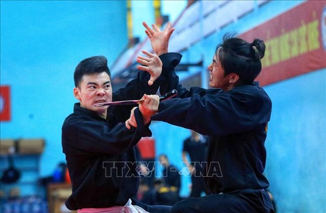 Trong ảnh: Hai vận động viên đội tuyển tập các động tác Silat Seni. Ảnh: Tuấn Anh - TTXVN