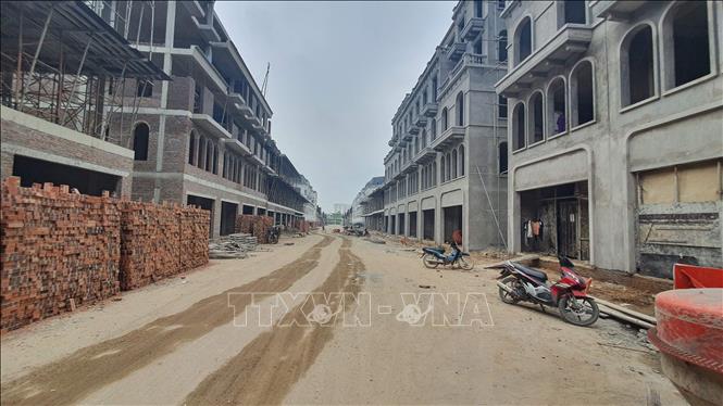 Trong ảnh: Khu nhà ở đang xây dựng thuộc dự án SKY GARDEN tại phường Liên Bảo và Khai Quang, thành phố Vĩnh Yên (Vĩnh Phúc). Ảnh: Nguyễn Trọng Lịch - TTXVN
