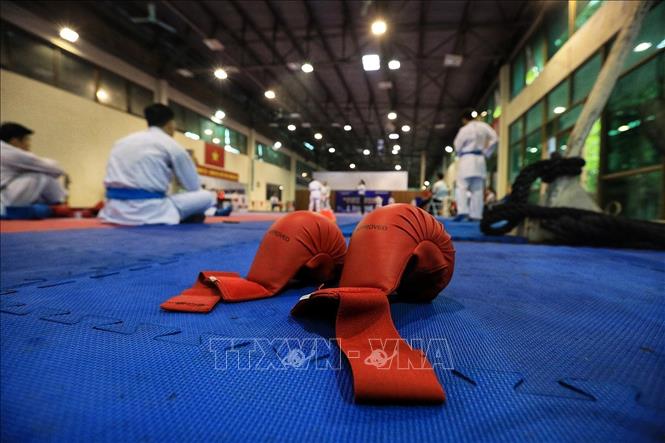 Trong ảnh: Đôi găng thi đấu của các vận động viên đội tuyển Karate Việt Nam. Ảnh: Tuấn Anh - TTXVN