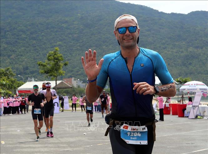 Trong ảnh: Niềm vui của một vận động viên quốc tế khi tham gia cuộc thi. Ảnh: Trần Lê Lâm - TTXVN 