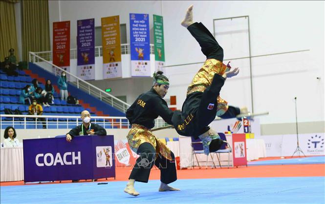 Cặp VĐV nam của Việt Nam thi đấu bán kết bài đối luyện tự chọn (Ganda). Ảnh: Quang Quyết-TTXVN