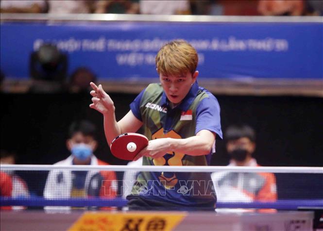 Pha tấn công của VĐV số 30 Chew Zhe Yu Clarence (Singapore). Ảnh: Quý Trung – TTXVN