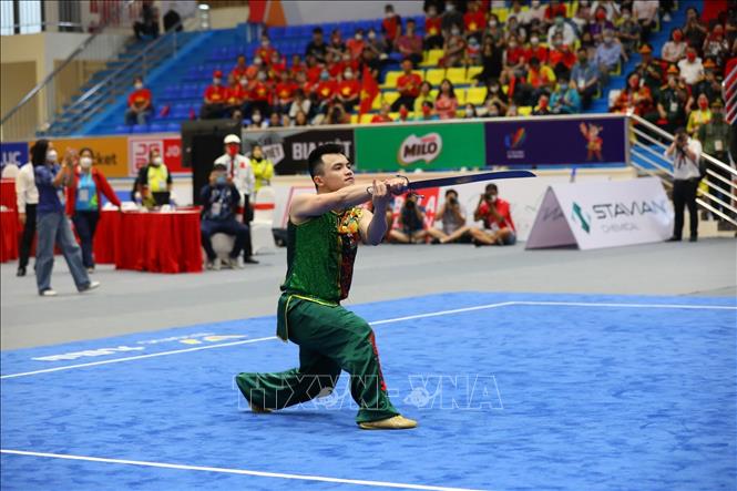 VĐV Nông Văn Hữu (Việt Nam) đoạt huy chương Đồng nội dung Nam đao nam với thành tích 9,67 điểm. Ảnh: Ngọc Liên - TTXVN