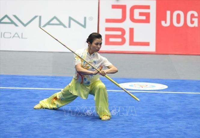 VĐV Hoàng Thị Phương Giang (Việt Nam) biểu diễn bài Thương thuật nữ, đạt 9,71 điểm. Ảnh: Phạm Hậu - TTXVN