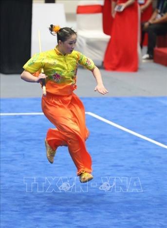 VĐV Singapore biểu diễn bài Thương thuật nữ. Ảnh: Phạm Hậu - TTXVN
