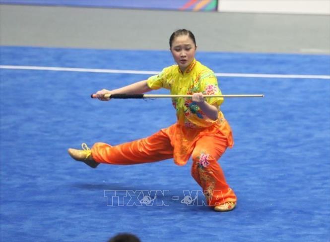 VĐV Singapore biểu diễn bài Thương thuật nữ. Ảnh: Phạm Hậu - TTXVN