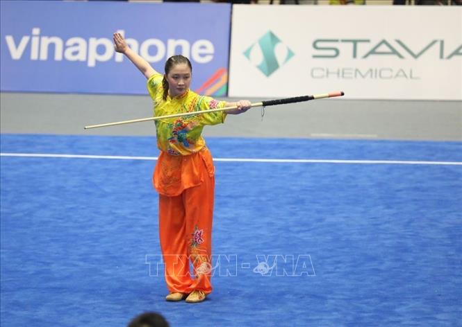VĐV Singapore biểu diễn bài Thương thuật nữ. Ảnh: Phạm Hậu - TTXVN