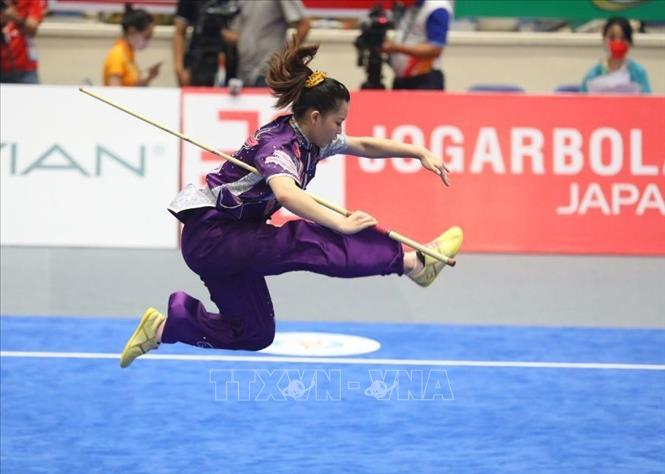 VĐV Singapore biểu diễn bài Thương thuật nữ. Ảnh: Phạm Hậu - TTXVN