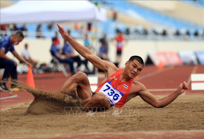 VĐV Suttisak Singkhon (Thái Lan) thi đấu nội dung nhảy xa nam. Ảnh: Huy Hùng - TTXVN