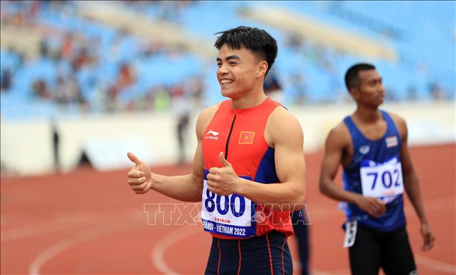 VĐV Ngân Ngọc Nghĩa (Việt Nam) thi đấu nội dung 200m nam. Ảnh: Huy Hùng - TTXVN
