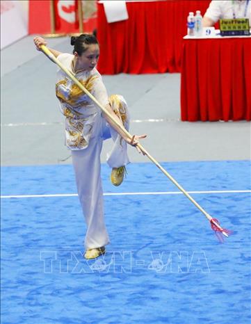 Bài thi chung kết nội dung Thương thuật nữ của VĐV Dương Thúy Vi đạt 9,70 điểm. Ảnh: Phạm Hậu-TTXVN