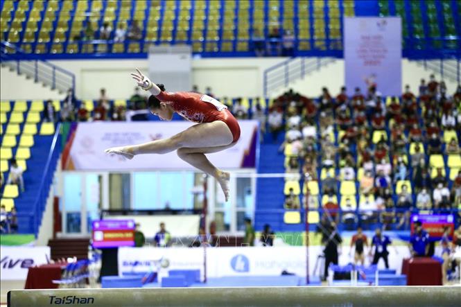 Gymnast Shandy Poh (No.41 - Singapore) competes in the Balance Beam event. VNA Photo 