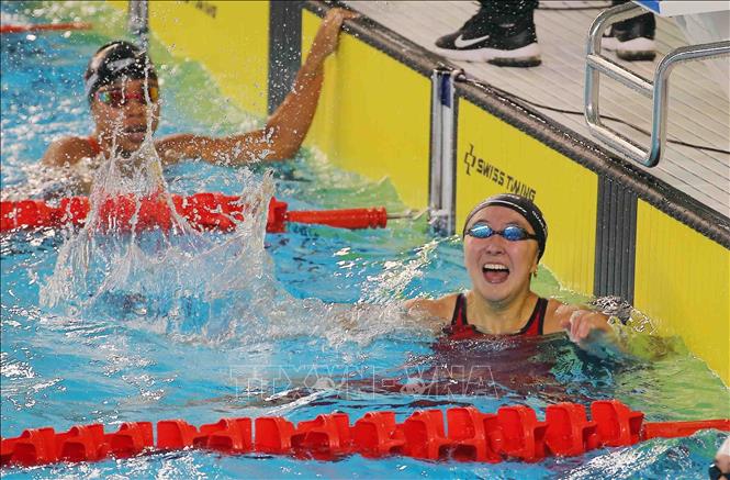 Niềm vui của VĐV Singapore Jing Wen Quah khi đạt HCV và phá kỷ lục SEA Games nội dung 200m bơi bướm nữ với thành tích 2 phút 09 giây 52. Ảnh: Phạm Kiên - TTXVN